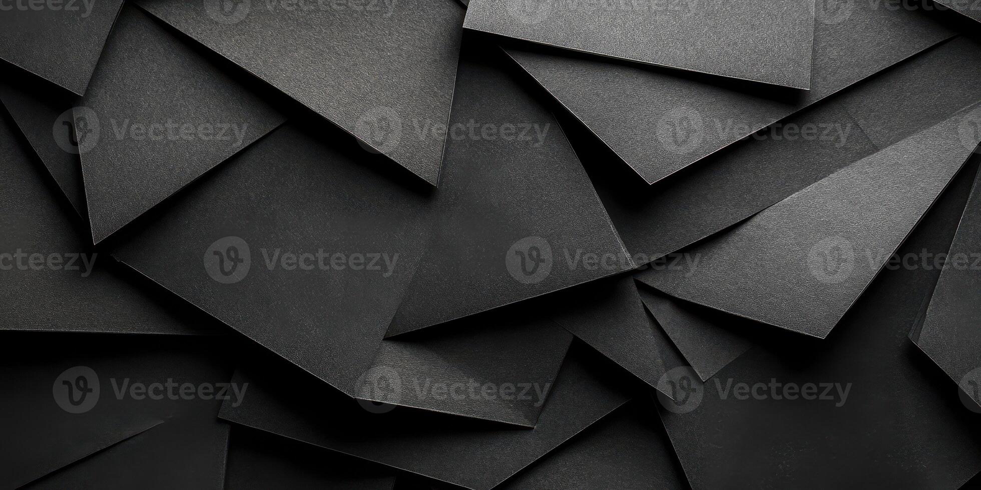 Black paper art showcasing layered geometric shapes at an art studio photo