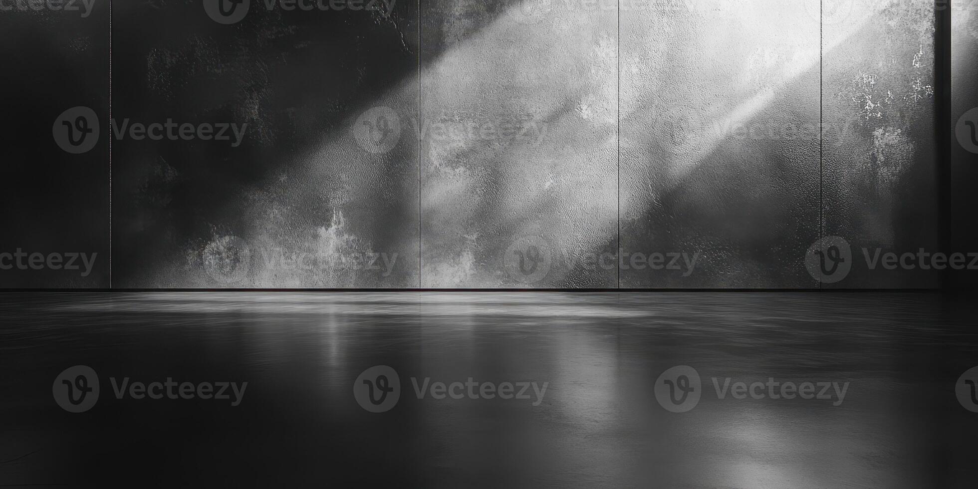 Soft light casting shadows on a polished concrete floor in an empty industrial space photo