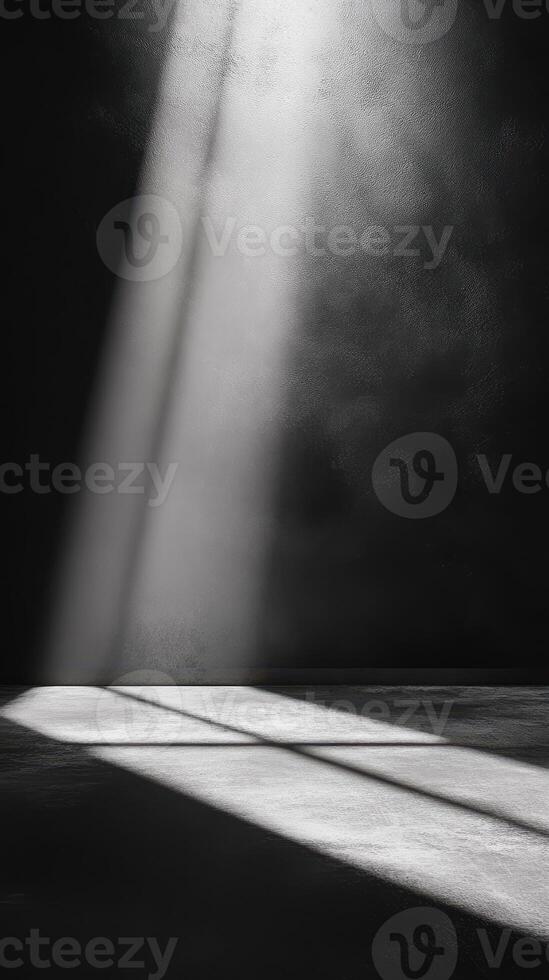 Light beams illuminate a dark space creating dramatic shadows in an artistic setting photo