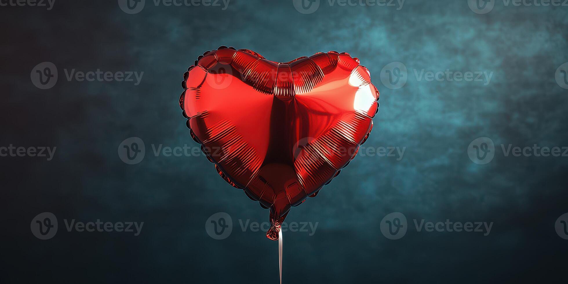 Heart-shaped balloon floating against a textured blue background creating a romantic atmosphere photo