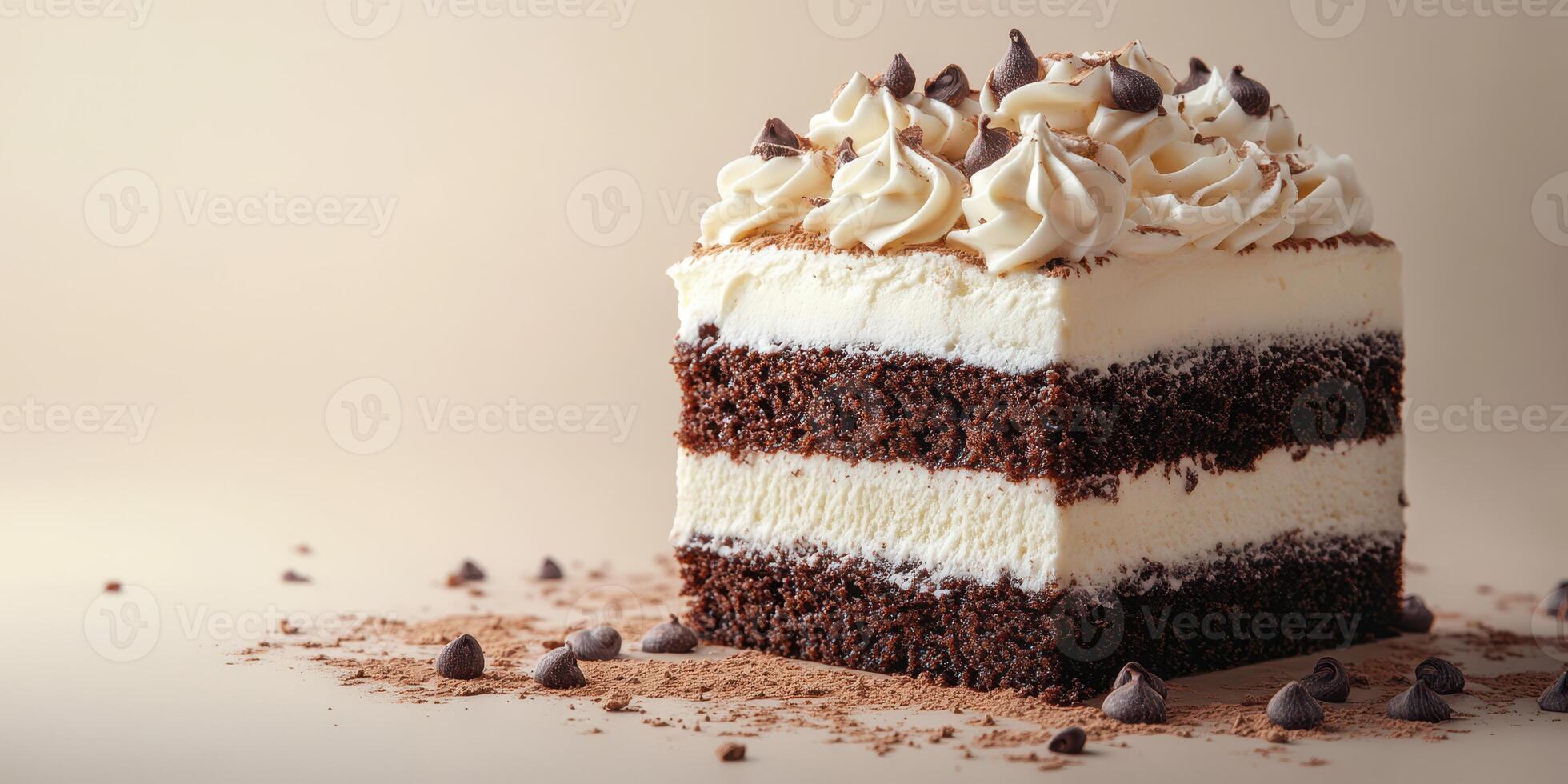 Rich chocolate cake layered with creamy frosting and chocolate chips on a neutral background photo