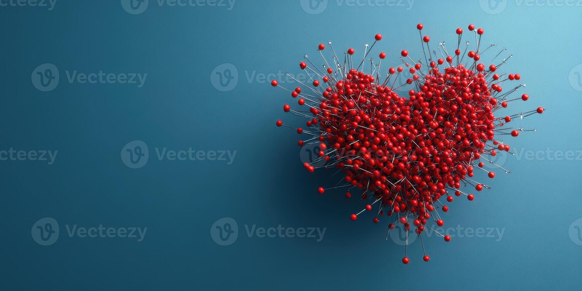 Heart shape created with red pins on a blue background symbolizing love and connection photo