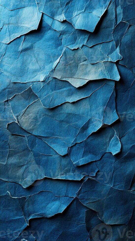 Textured blue paper layers create a visually striking backdrop with intricate details photo