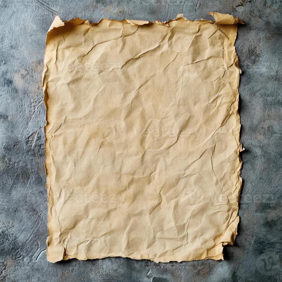 Textured crumpled paper on a dark surface creates a vintage and rustic aesthetic for creative projects photo