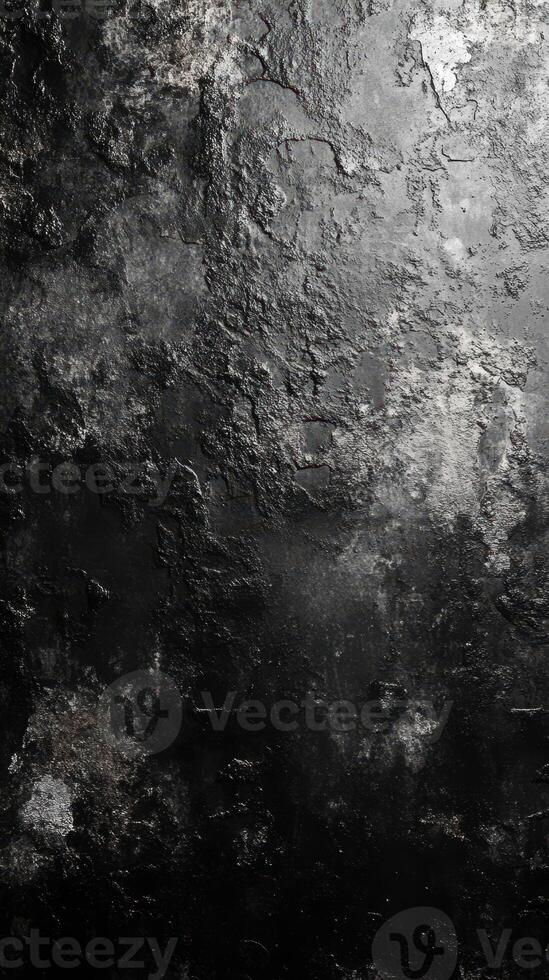 Textured dark surface resembles rough stone, creating an abstract backdrop for artistic purposes and design elements photo