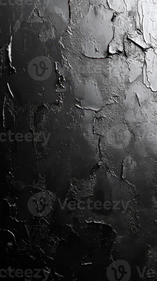 Dark textured wall showcasing a striking abstract design with various layers and patterns under soft lighting photo