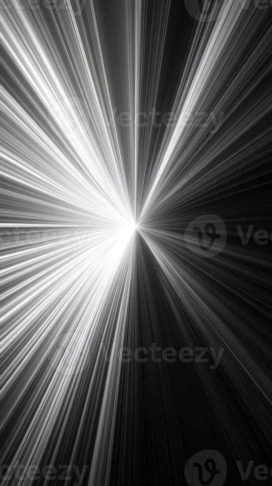 Light rays emanating from a central point create a dynamic burst of energy in a dark setting photo