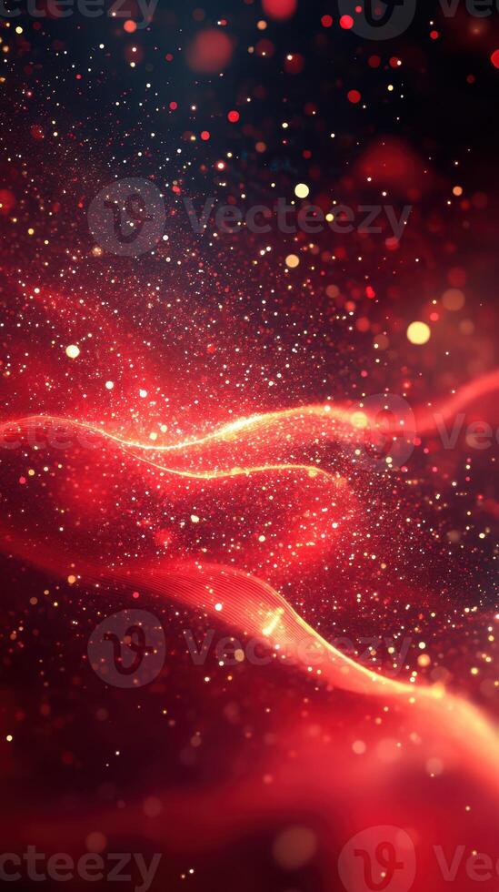 Abstract red and gold particles shimmering in the dark with flowing wave patterns during a creative design session photo