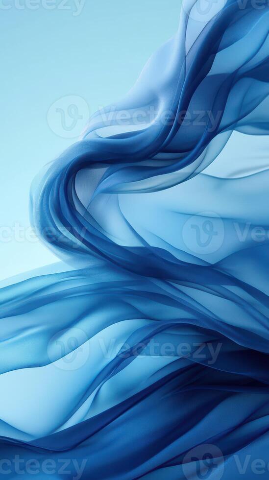 Swirling shades of blue create an ethereal atmosphere with delicate fabric movements in soft light photo