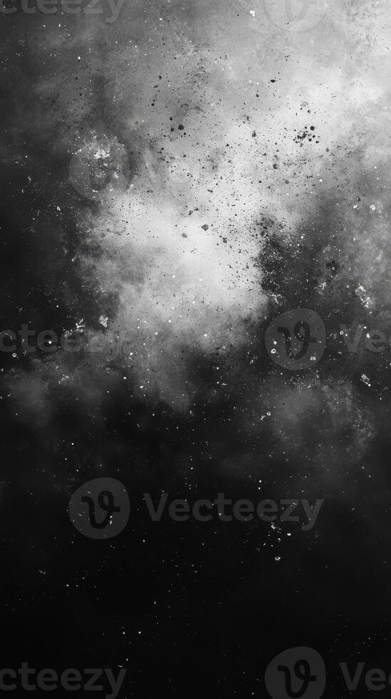 Textured black and white abstract cloud formation with scattered particles in a cosmic setting photo