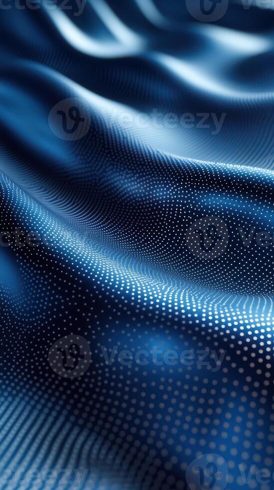 Smooth blue fabric with intricate dot patterns capturing light and creating depth and texture in a serene composition photo