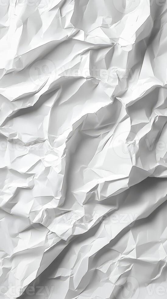 Crumpled white paper creating a textured backdrop for artistic and creative projects photo