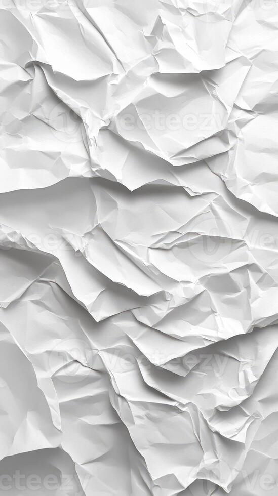 Crumpled white paper texture showcases intricate folds and creases in bright lighting photo