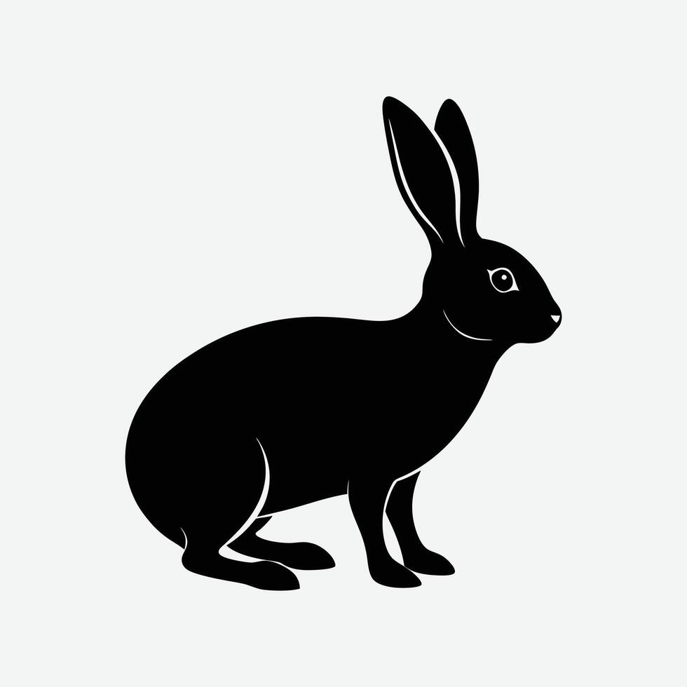 a black and white silhouette of a rabbit. vector