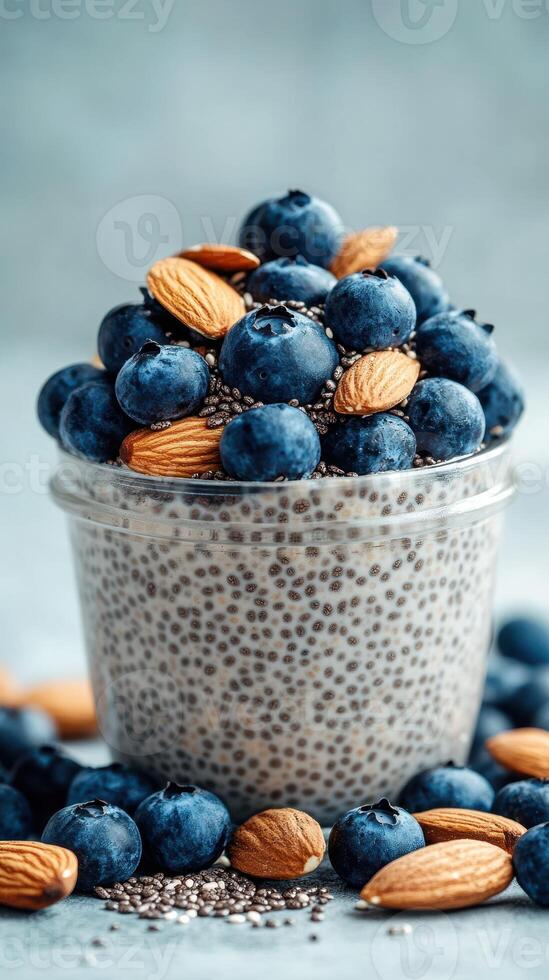 Healthy chia seed pudding topped with fresh blueberries and almonds for a nutritious breakfast photo