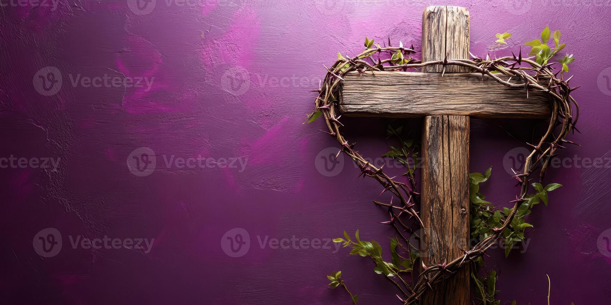 Rustic heart-shaped cross with thorns and greenery against a purple wall photo