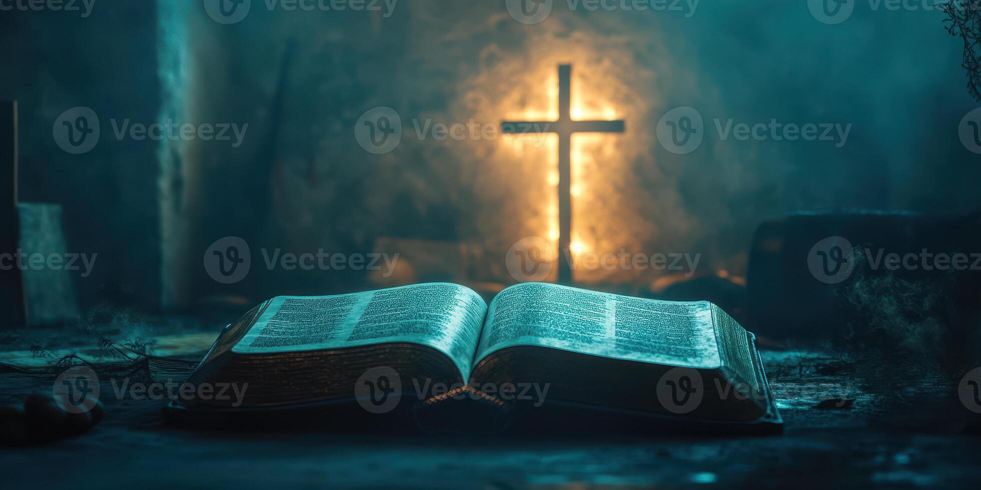 Open book with illuminated cross in dimly lit space during evening hours photo
