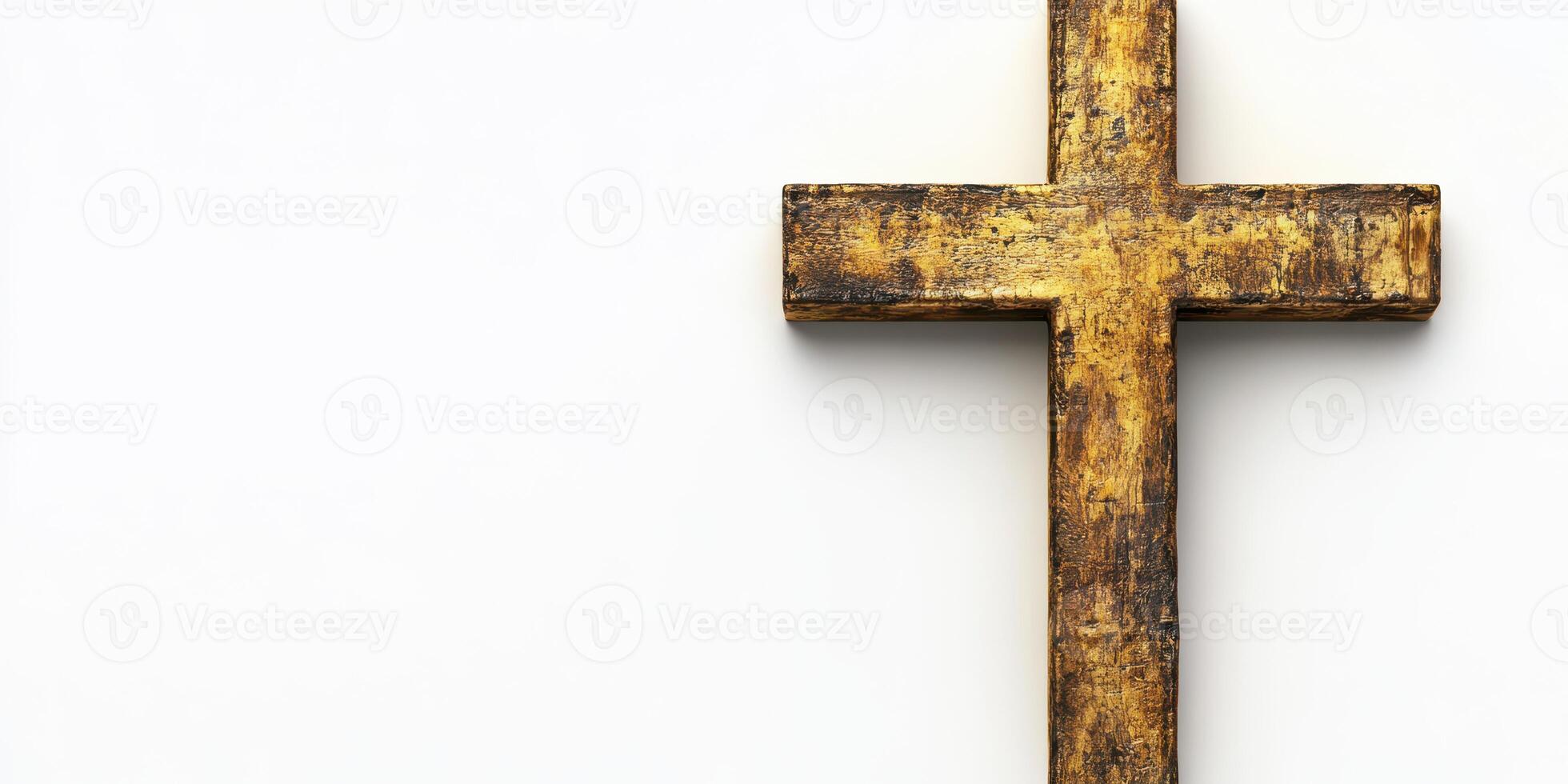 Wooden cross with a rustic finish displayed against a plain background photo