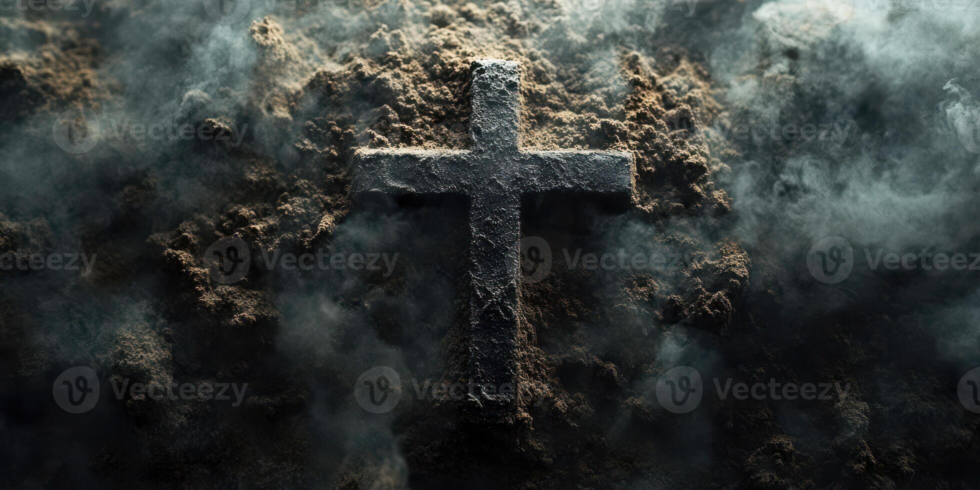 Cross emerging from dark earth surrounded by mist conveys a sense of mystery and reflection in a somber atmosphere photo