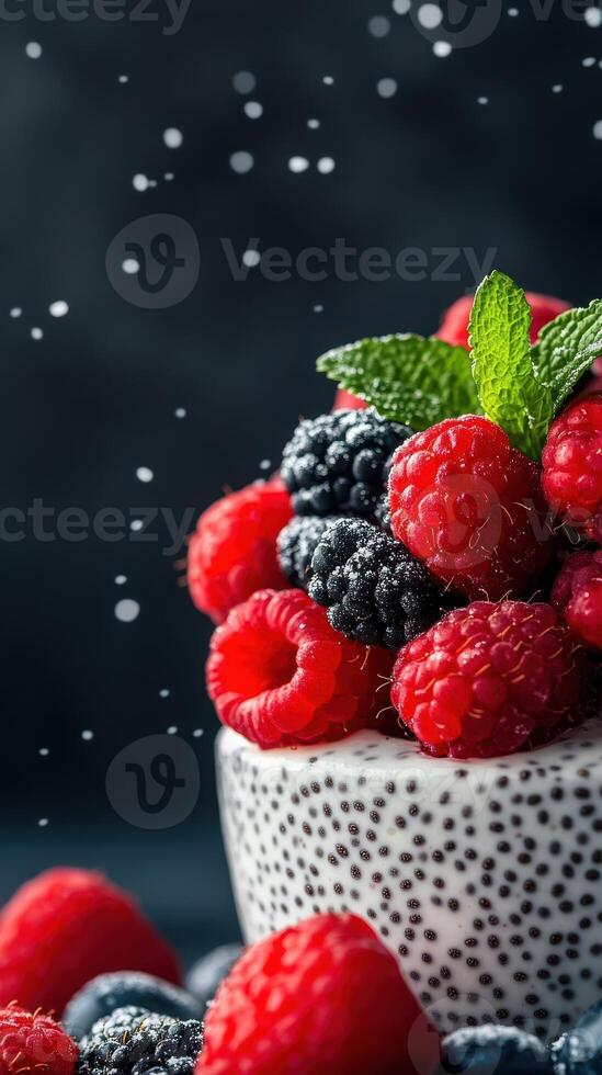 Fresh berries in a textured bowl with water droplets captured in a vibrant display at a kitchen setting photo
