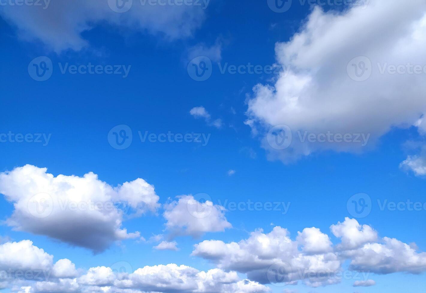 Clear blue sky textre and white fluffy cloud nature background. The sun shines bright in the daytime in summer photo