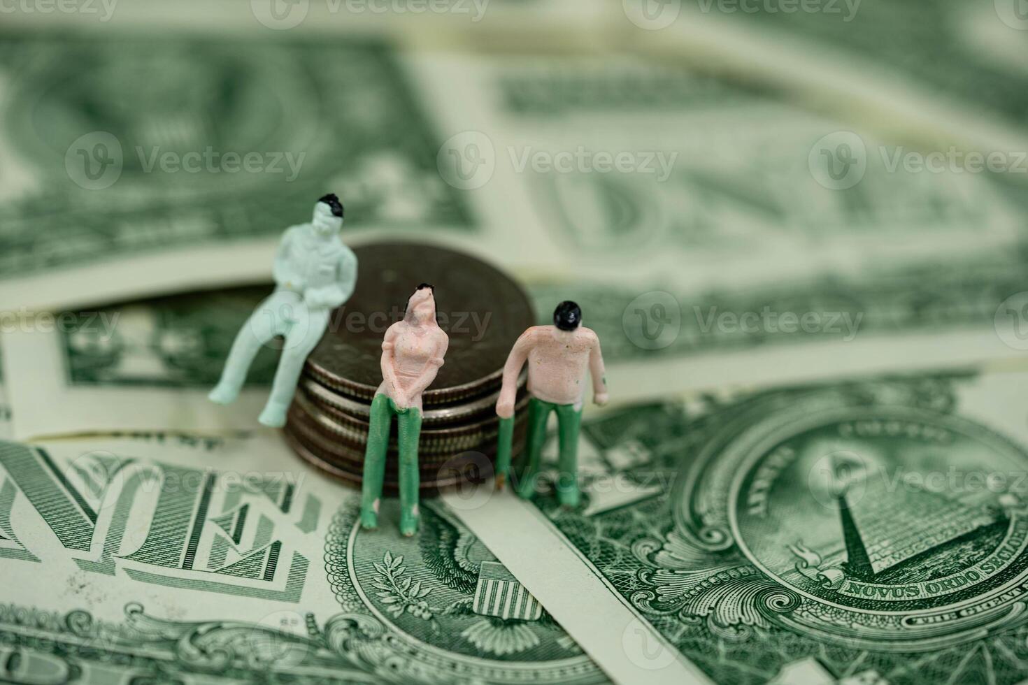 three figures with US Banknotes photo