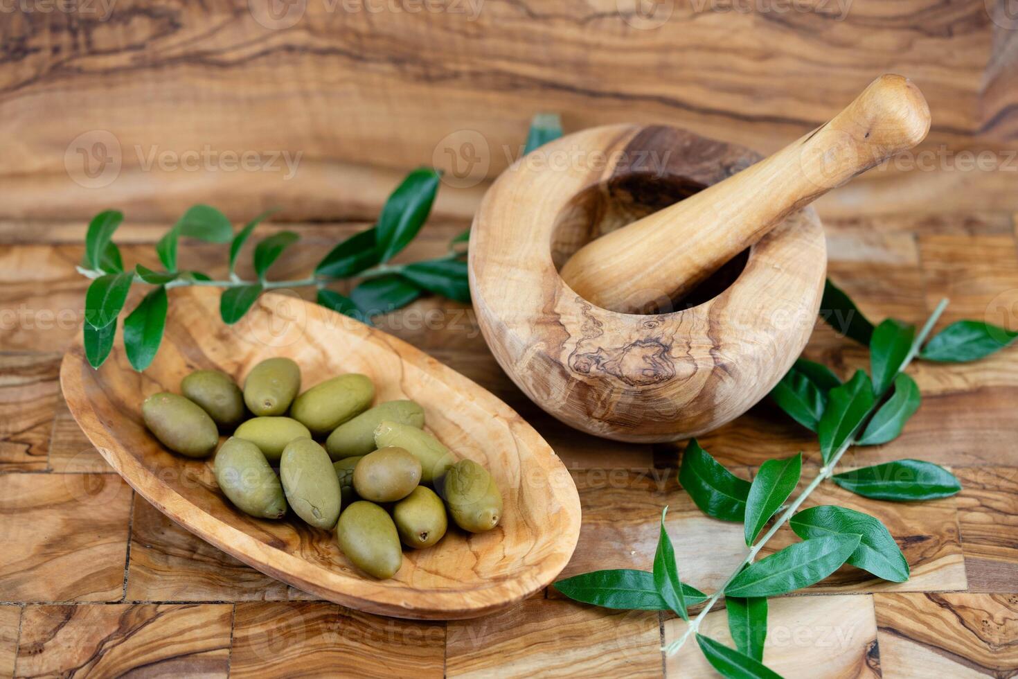 olives and mortar for cold pressed oliveoil photo