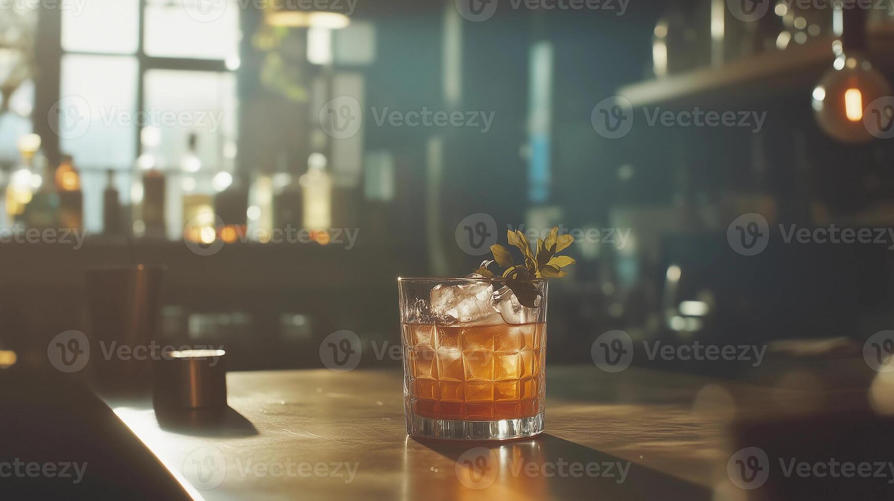 A glass of liquor with a leaf on top sits on a table. The image has a warm, inviting mood, with the glass of liquor and the leaf on top creating a sense of relaxation photo