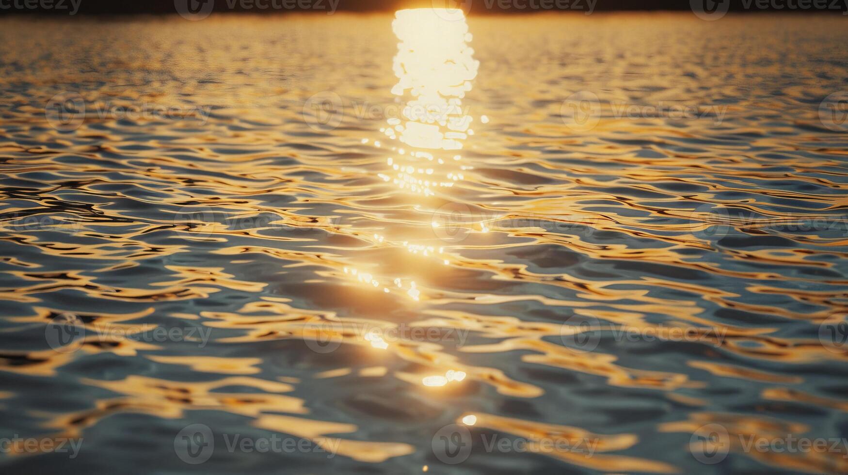 The moon is reflected on the water at night photo