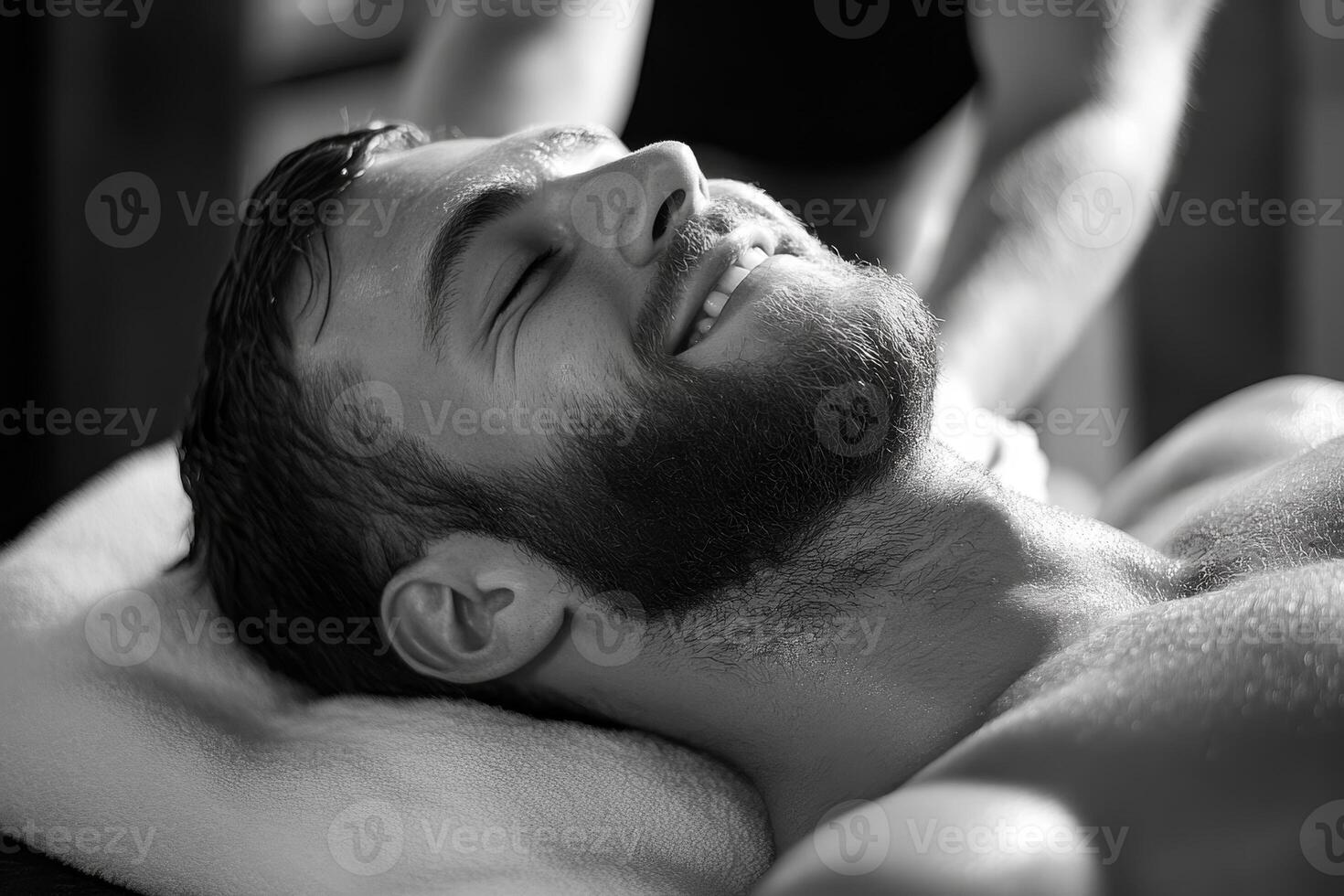 Relaxation and rejuvenation unfold as a skilled therapist provides a soothing massage experience in a tranquil spa setting photo