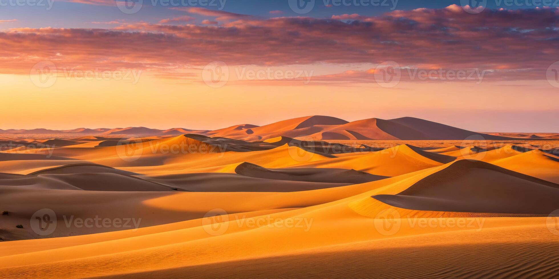 Panoramic view of vast desert landscape with soft dunes and warm tones at sunset photo
