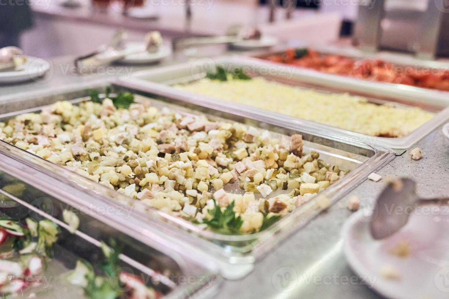 Selective focus on fresh vegetable salad. Dietary nutrition in metal containers with space for copying photo