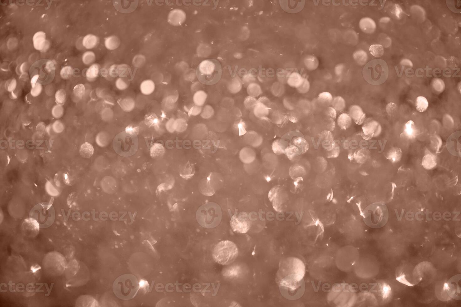 Color of the year 2025 Mocha Mousse. A defocused background is an abstract blurry light element. photo