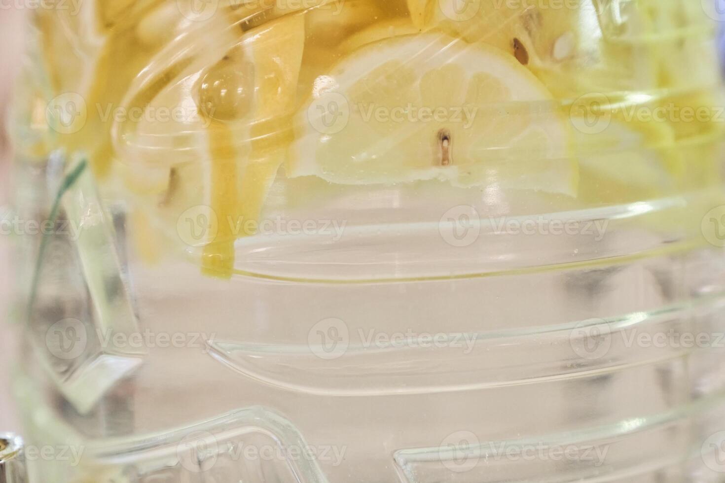 A healthy cocktail of water infused with citrus fruits and lemon. Diet drinks for detoxification with space to copy photo