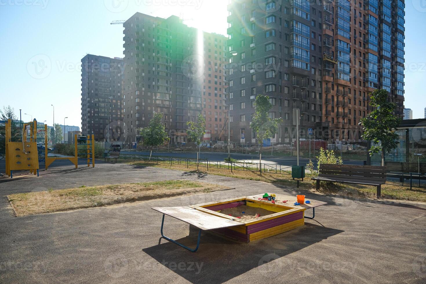playground with a view of the houses under construction in the new district photo
