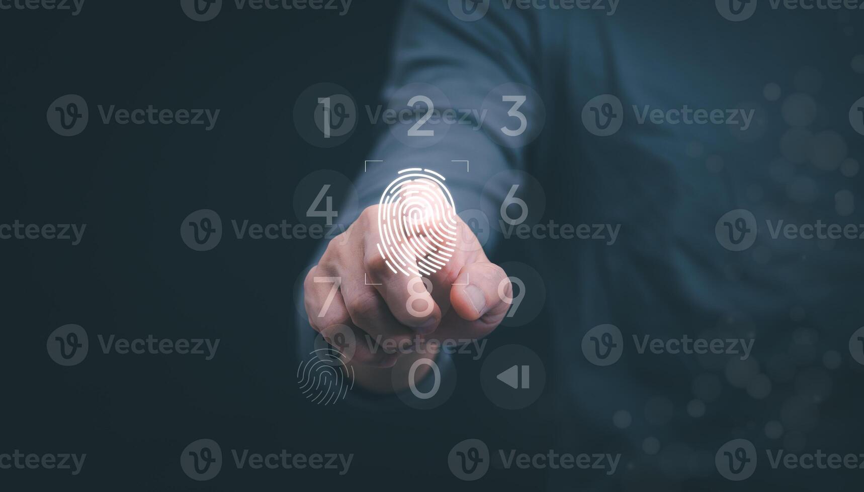a person pressing a finger on a digital button photo