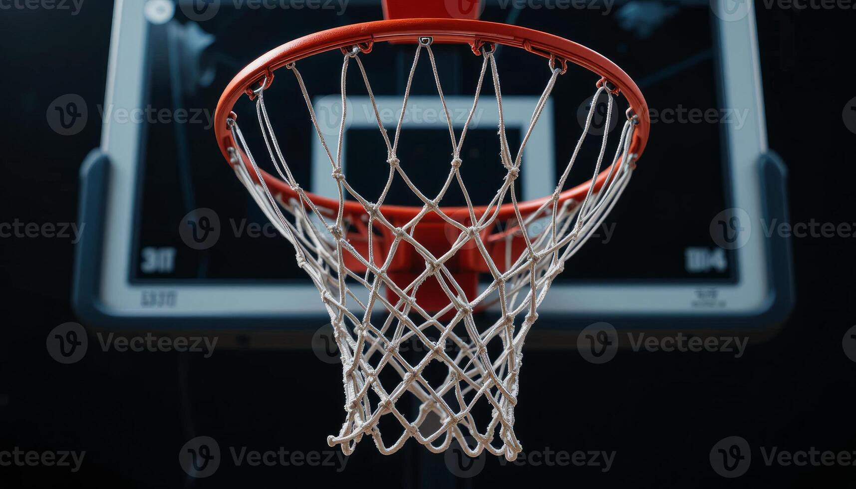 Close-Up of Basketball Hoop Net and Blurred Backboard photo
