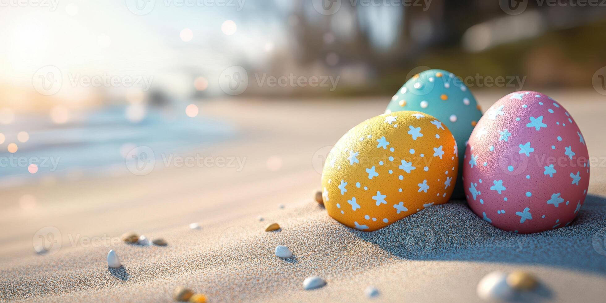 Colorful Easter eggs resting on sandy beach with ocean waves in the background during bright sunny day photo