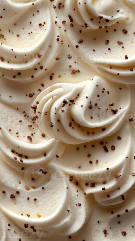 Whipped cream swirls topped with chocolate sprinkles create an appealing dessert decoration photo