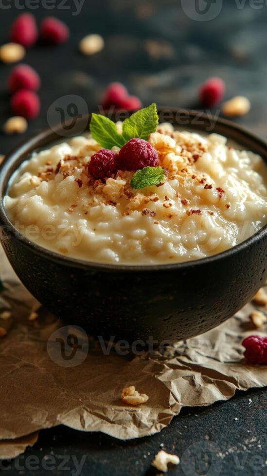 Creamy rice pudding topped with fresh raspberries and nuts for a delightful dessert experience photo