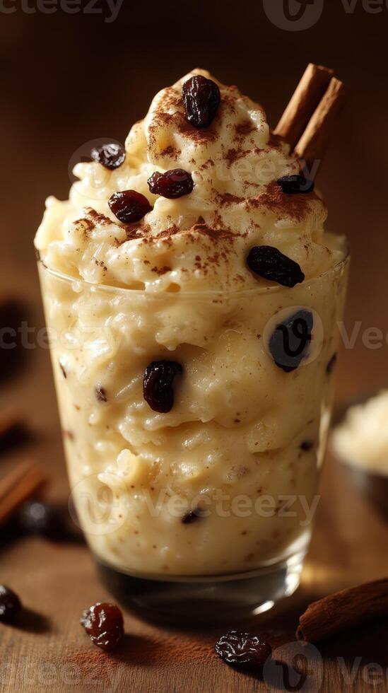 Creamy rice pudding with raisins and cinnamon in a glass dish perfect for winter gatherings photo