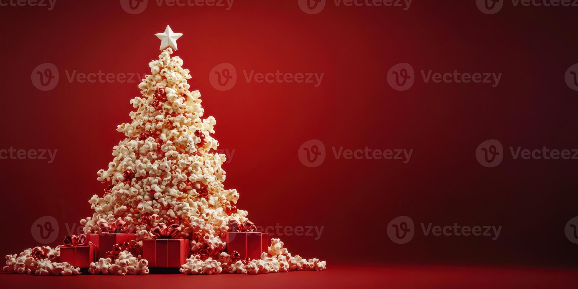 Creative popcorn tree decorated with gifts on a red backdrop during festive season photo