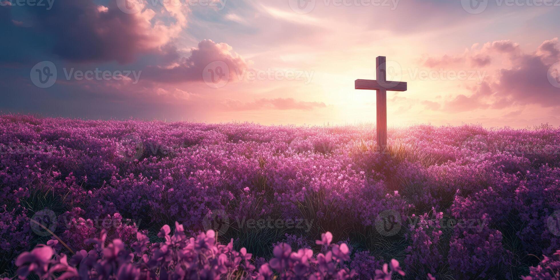 Vibrant purple flowers surround a wooden cross at sunset in a serene landscape photo