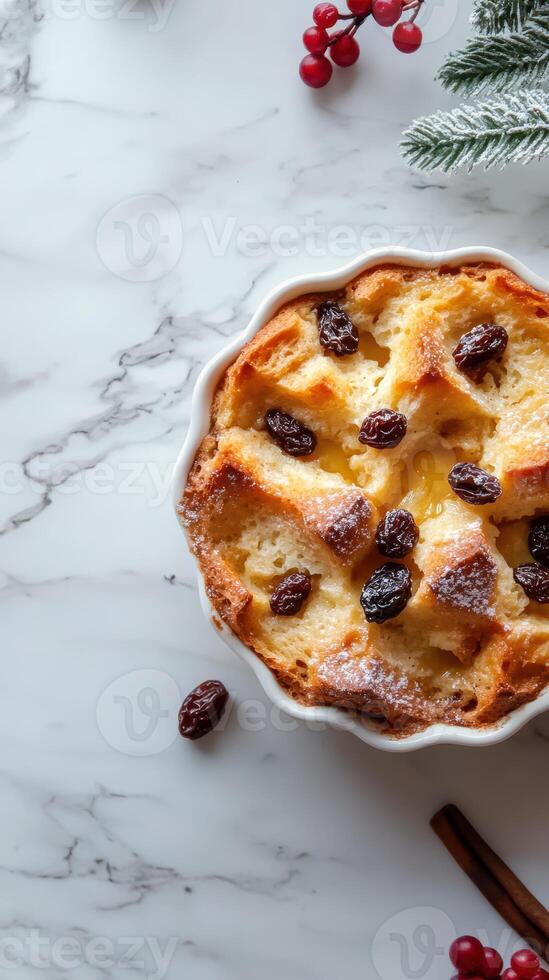 Delicious bread pudding topped with raisins served on a marble countertop during the holiday season photo