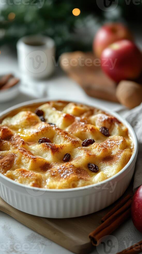 Delicious bread pudding topped with golden crust and raisins served in a cozy kitchen setting photo