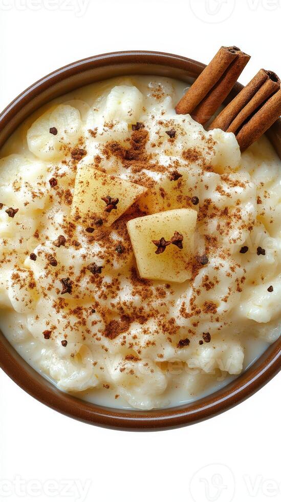 Creamy rice pudding topped with cinnamon and vanilla for a delightful dessert experience photo