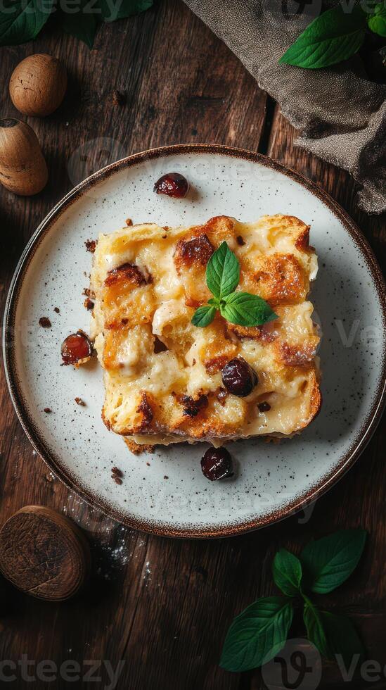 Delicious dessert on a rustic plate shows a golden crust and rich filling photo