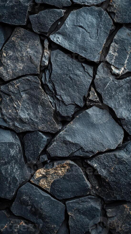 Textured dark stones creating a natural backdrop for creative projects and designs in modern decor photo