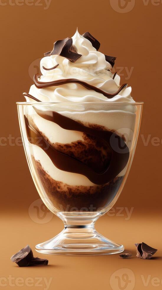 Delicious creamy dessert featuring swirls of chocolate and whipped cream served in a glass cup photo