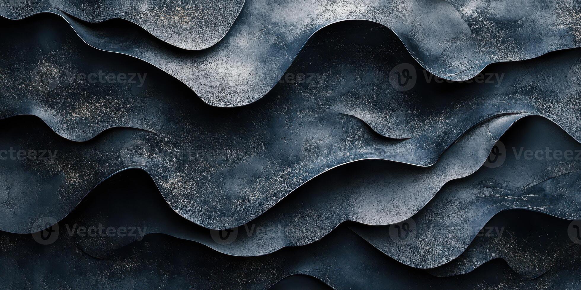 Waves of textured metal in dark tones create a dynamic pattern on a surface photo